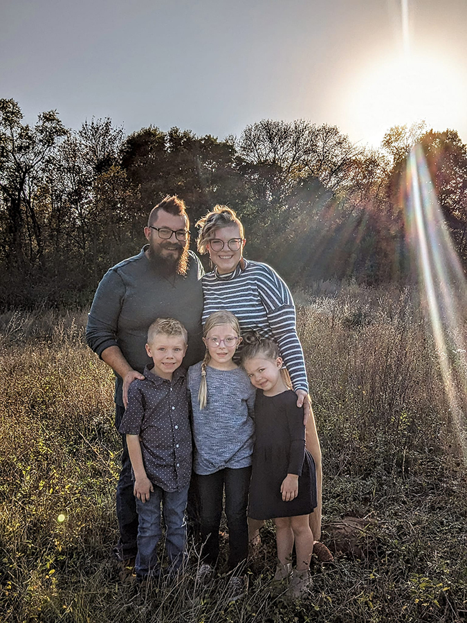 Photo of Logan Gruber family in a field near their Sauk Centre, MN home.
